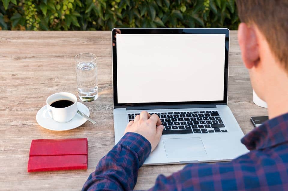 Tips for Moving Your Office Outdoors 2 men working