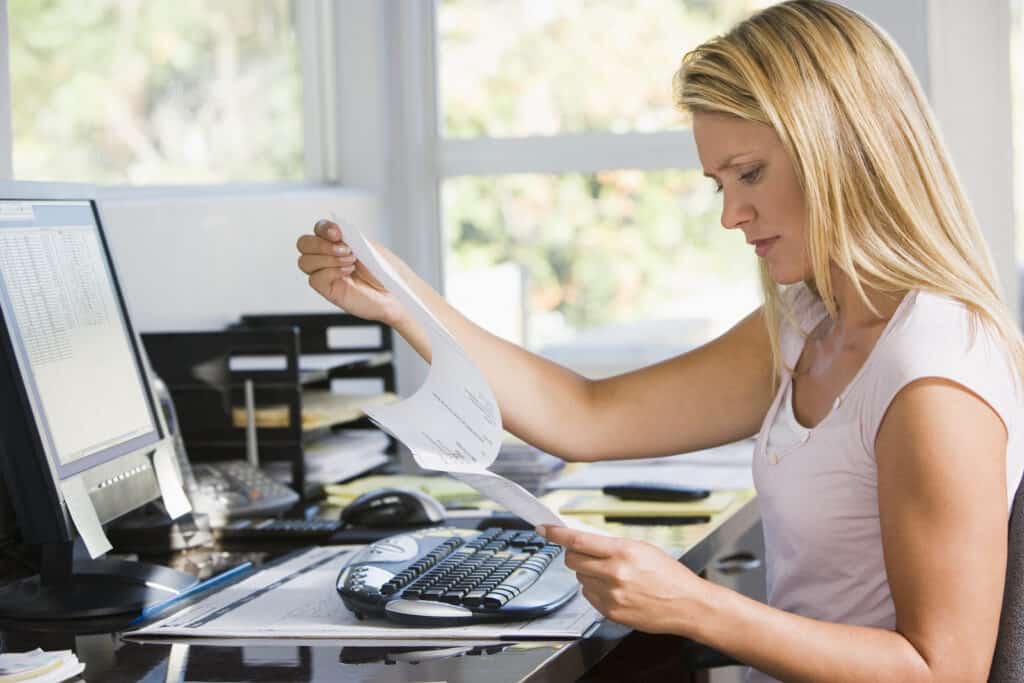 4 Sure Signs Your Home Business is Ruining Your Home 2 Woman in home office